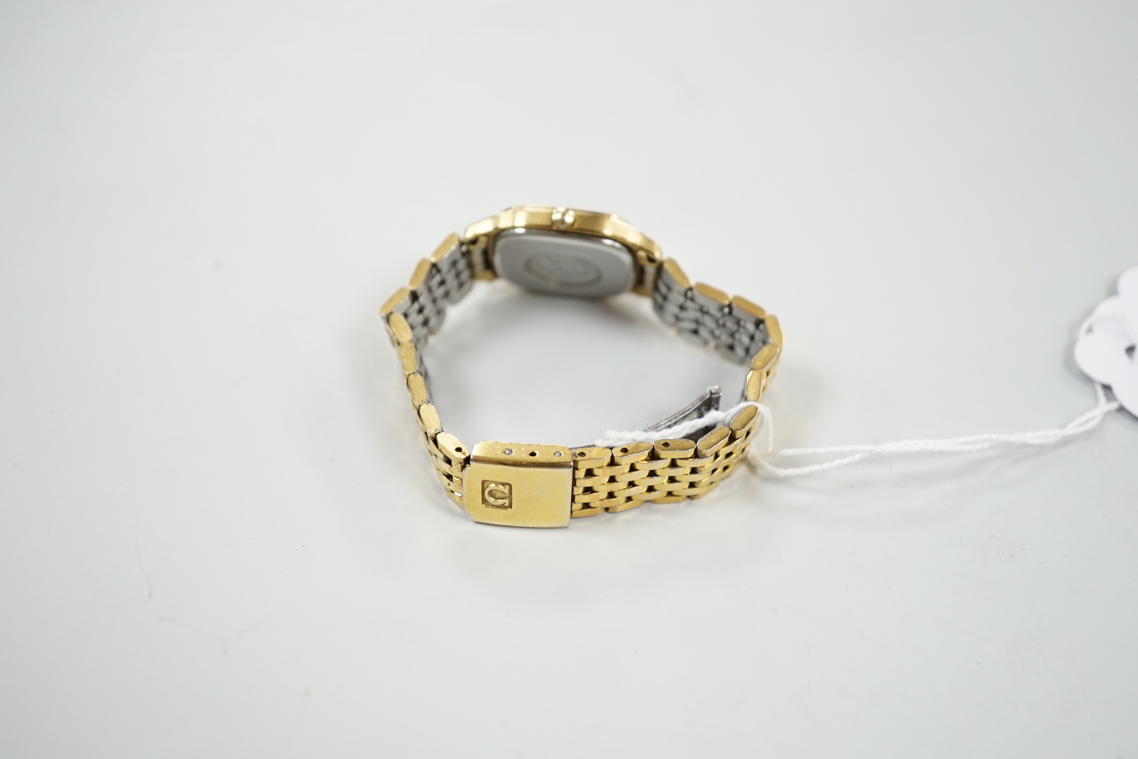A lady's steel and gold plated Omega Seamaster quartz wrist watch, on an Omega steel and gold plated bracelet.
